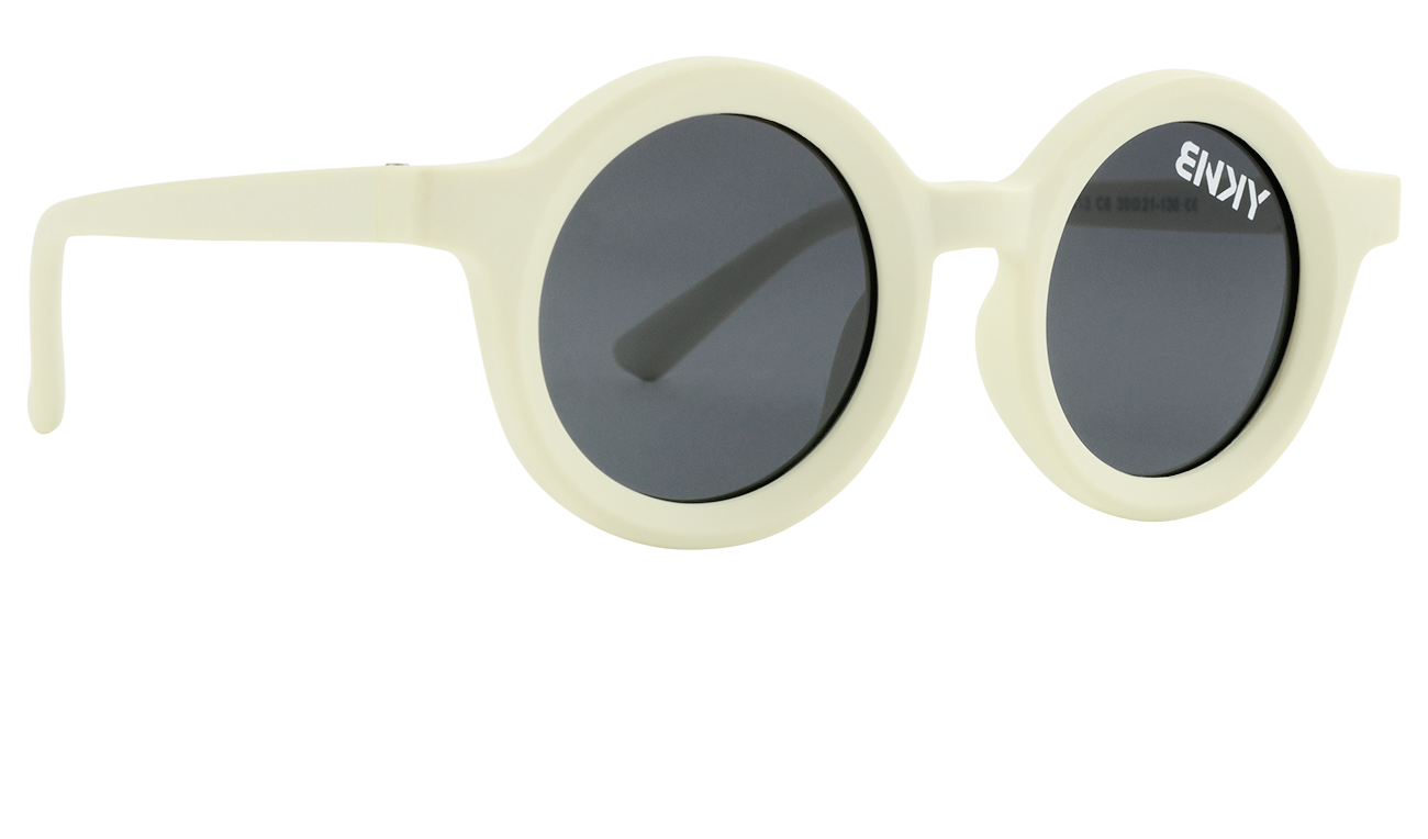 Stylish bone-colored round sunglasses with dark lenses, perfect for kids embracing a surf-snow-skate lifestyle.