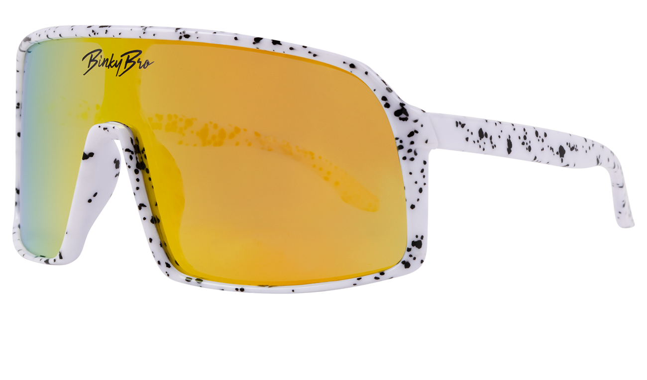Stylish Monteverde sunglasses in white with black speckles and yellow-tinted lenses, perfect for kids' outdoor adventures.