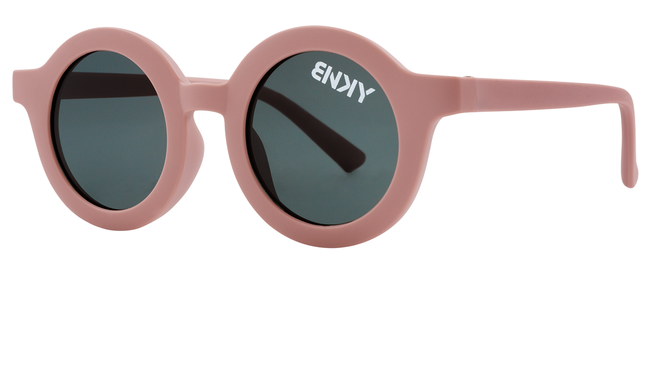 Stylish vintage round sunglasses in soft pink with dark lenses, perfect for a trendy look. Ideal for sunny days.