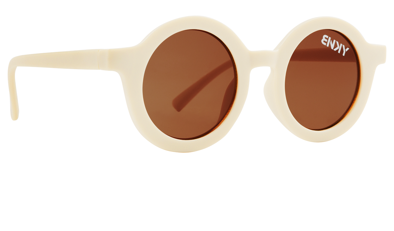 Stylish round sunglasses in sand color with brown lenses, perfect for kids who embrace a surf-snow-skate lifestyle.