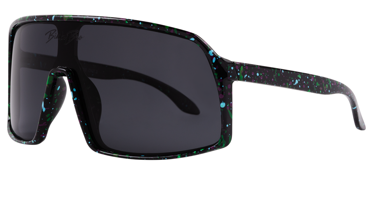 Stylish Monteverde sunglasses in Dynamite Black with colorful splatter design and dark lenses, perfect for outdoor adventures.