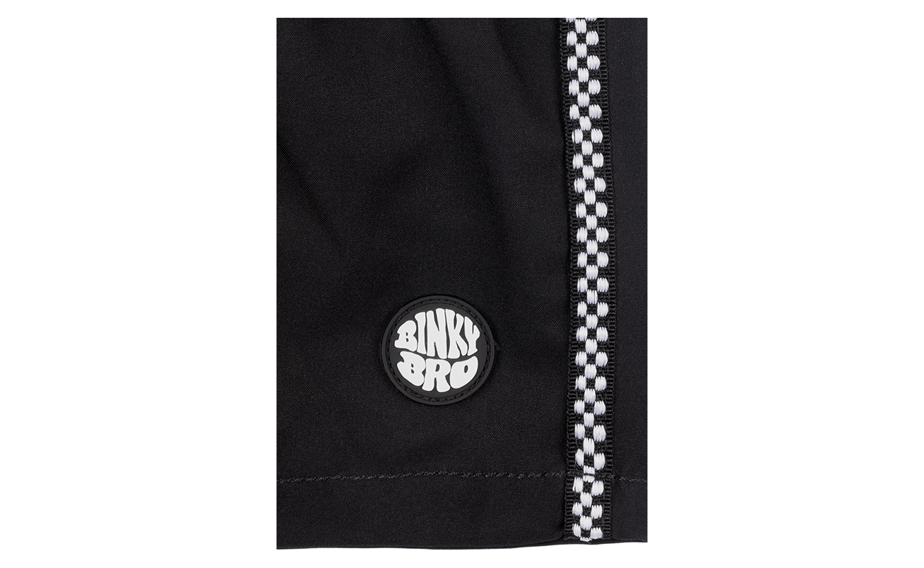 Close-up of the BinkyBro 8NKY Surf Swimmie featuring a black fabric with a decorative white stitch and logo patch.