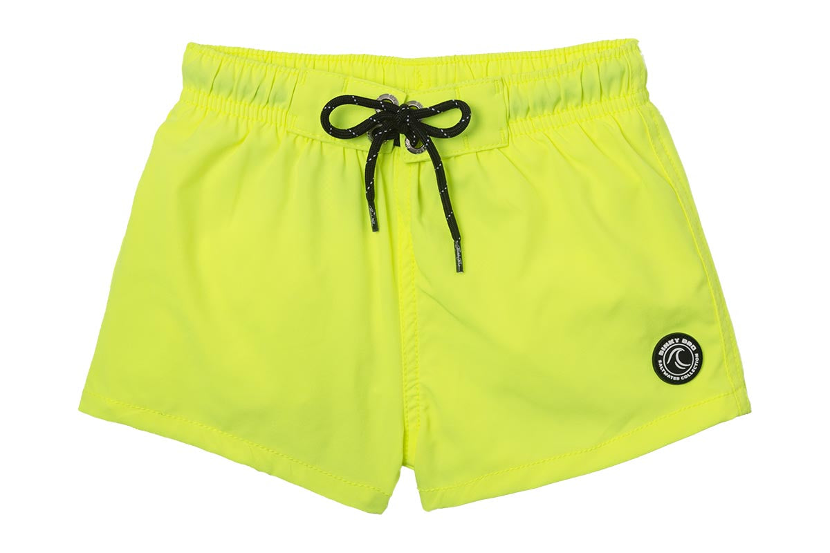 Bright yellow swim shorts with an elastic waistband and black drawstring, featuring a logo patch on the side. Perfect for active kids.