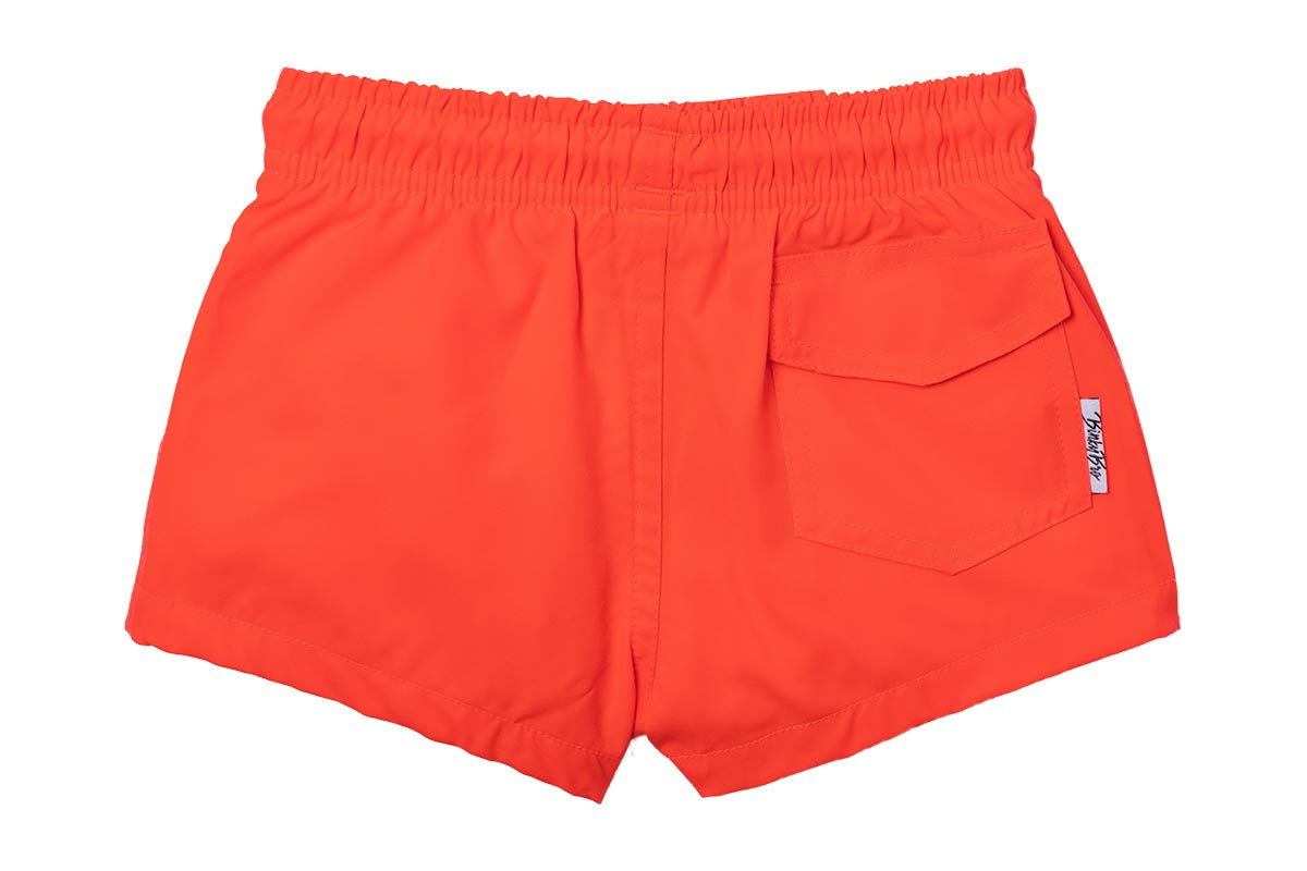 Bright orange swim shorts with an elastic waistband and a back pocket, designed for active kids. Perfect for summer fun.