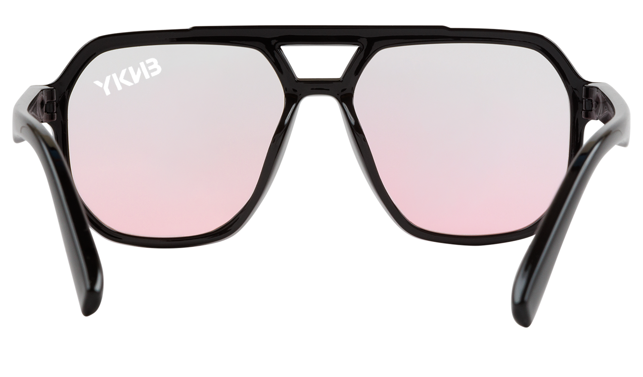 Sleek black sunglasses with pink gradient lenses, designed for a stylish and sporty look. Perfect for outdoor adventures.