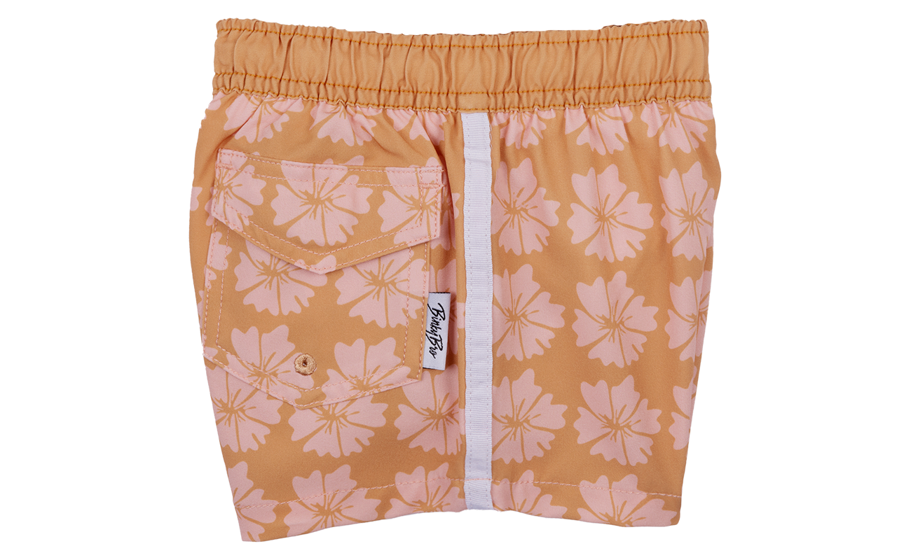Tavaura Swimmie swim shorts featuring a peach floral pattern, elastic waistband, and side pocket for kids.