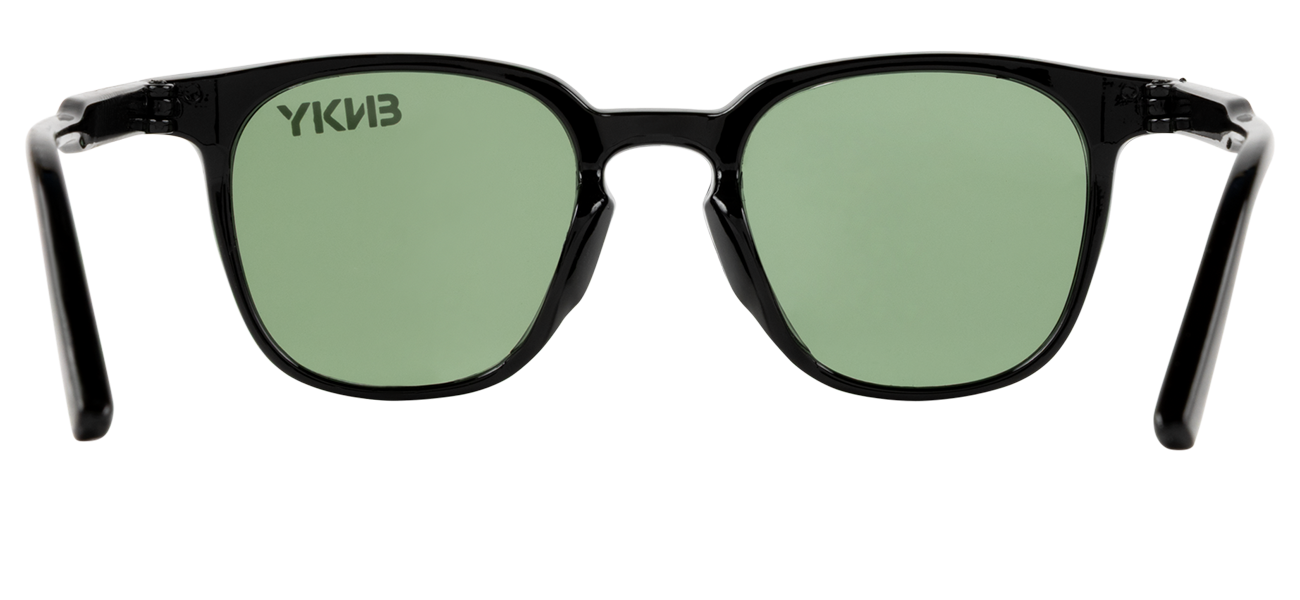 Stylish Alicante sunglasses in black with green lenses, perfect for a trendy look and sun protection.