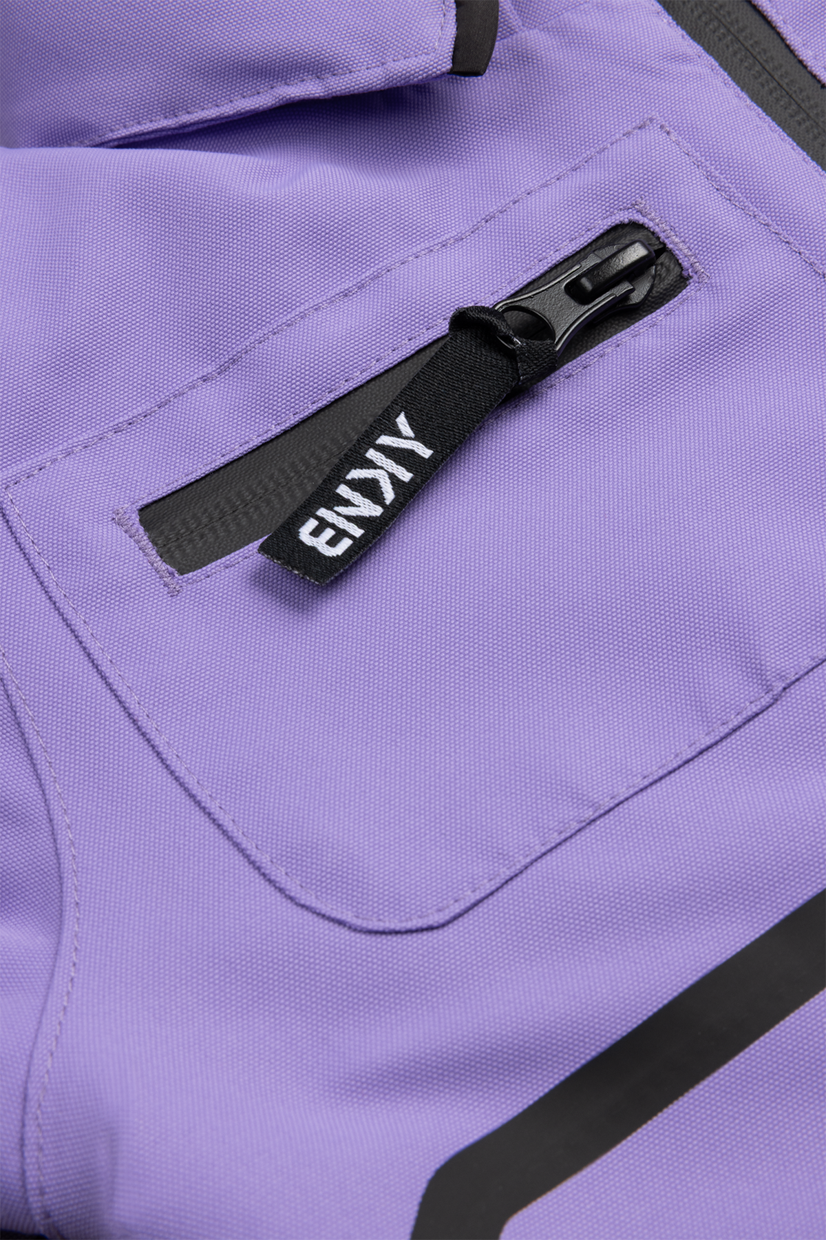 Stylish Roxy purple jacket featuring a zippered pocket and black accents, perfect for active youth.