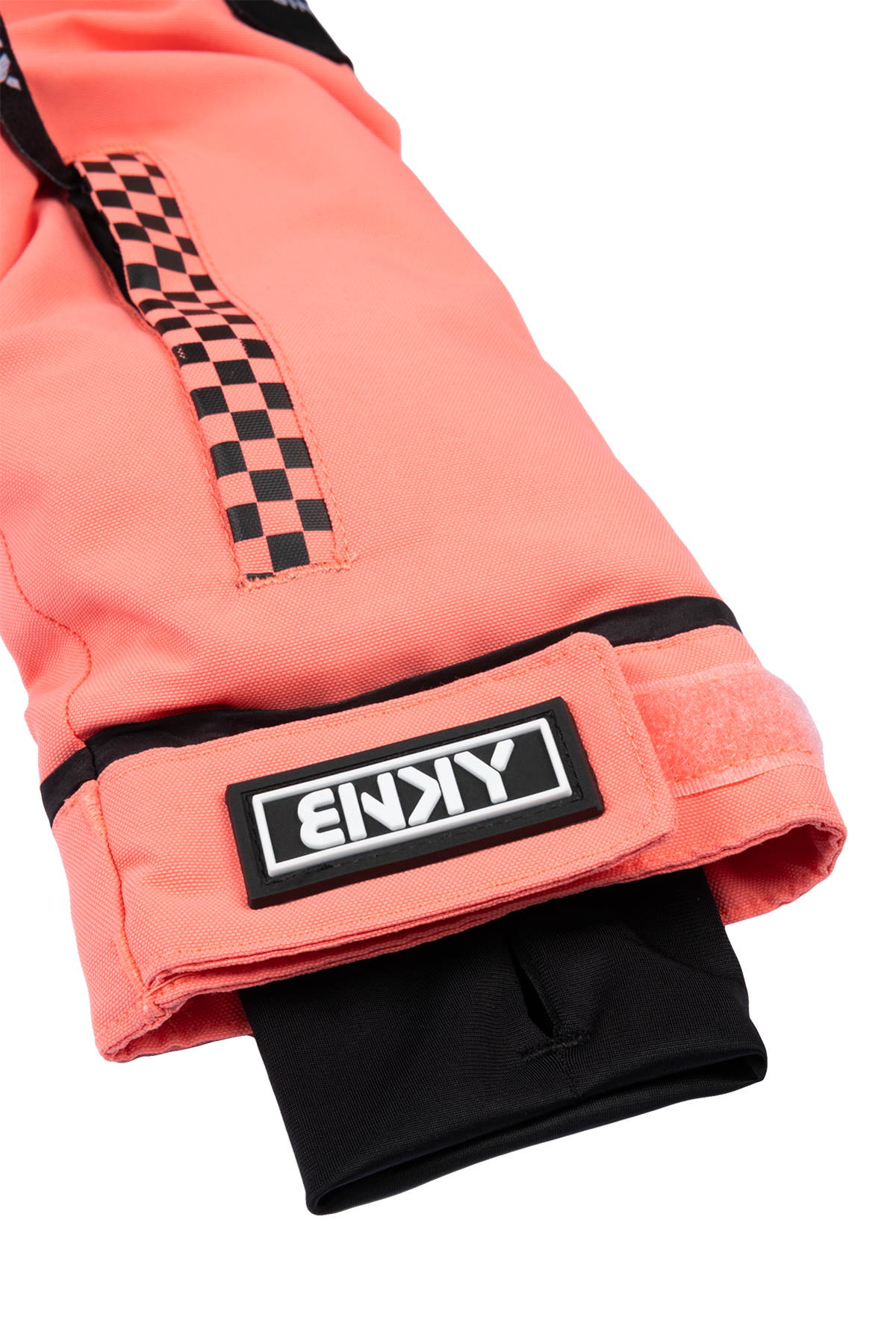 Stylish coral Roxy Georgia Peach sleeve with checkered detail and black cuff, perfect for active youth apparel.