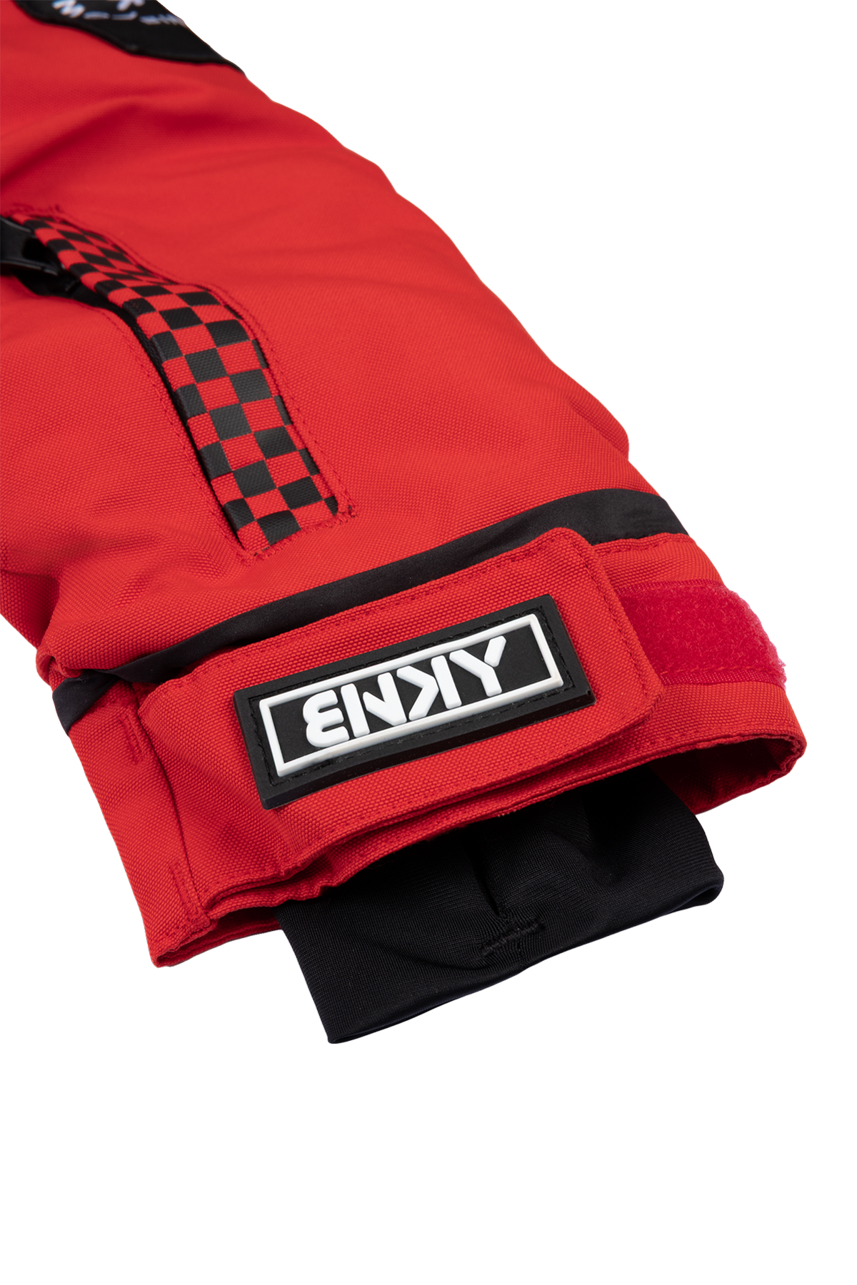 Red BNKY Imperial jacket sleeve featuring a checkered design and logo patch, designed for stylish outdoor adventures.