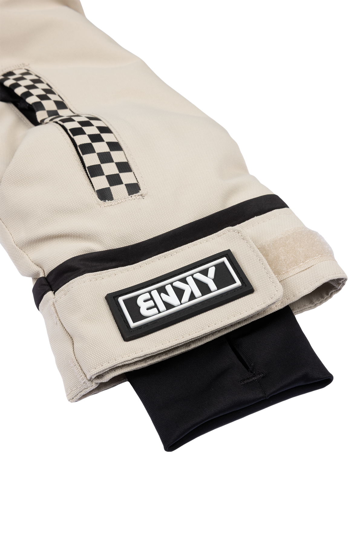 Stylish beige BNKY Island Fossil jacket sleeve featuring a checkered strap and logo patch, perfect for active youth.
