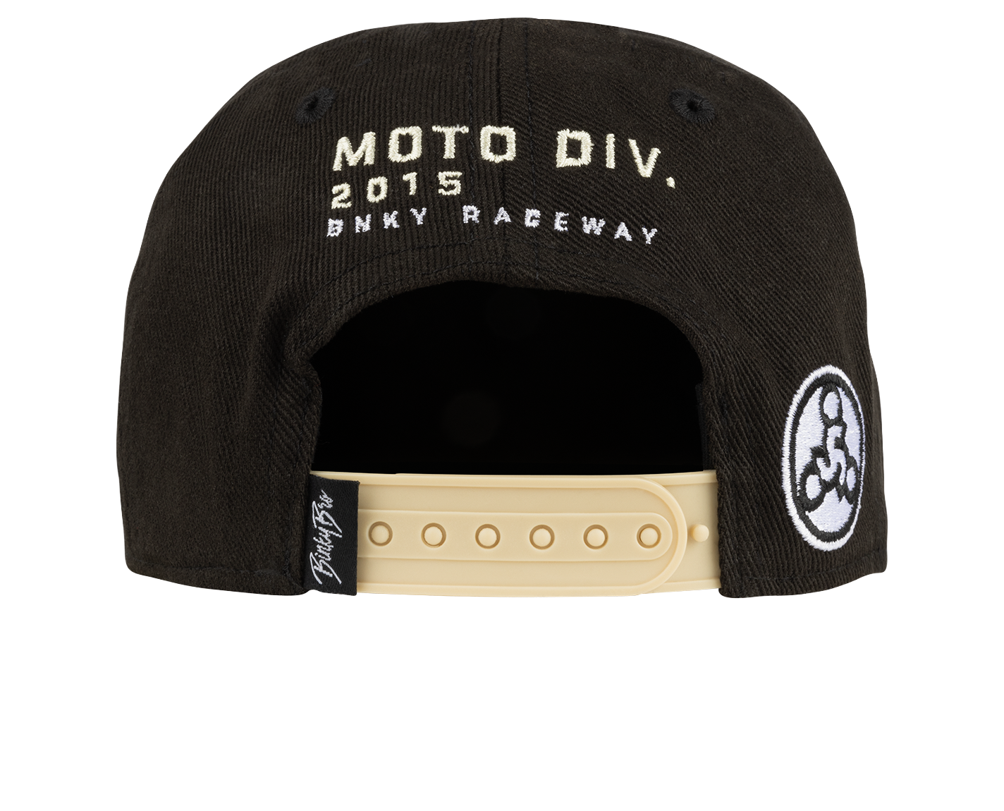 Back view of a black snapback hat featuring "MOTO DIV. 2015" and "BNKY RACEWAY" embroidery, with a beige adjustable strap.