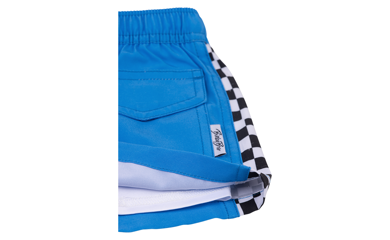 Blue shorts featuring a checkered side panel and a comfortable elastic waistband, perfect for active kids.