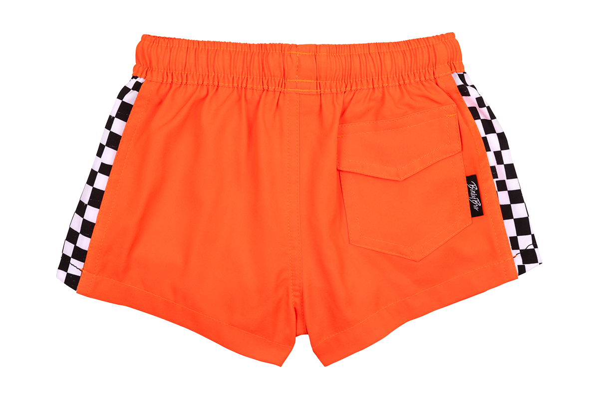 Bright orange swim shorts featuring checkered side panels and a back pocket, perfect for active youth.