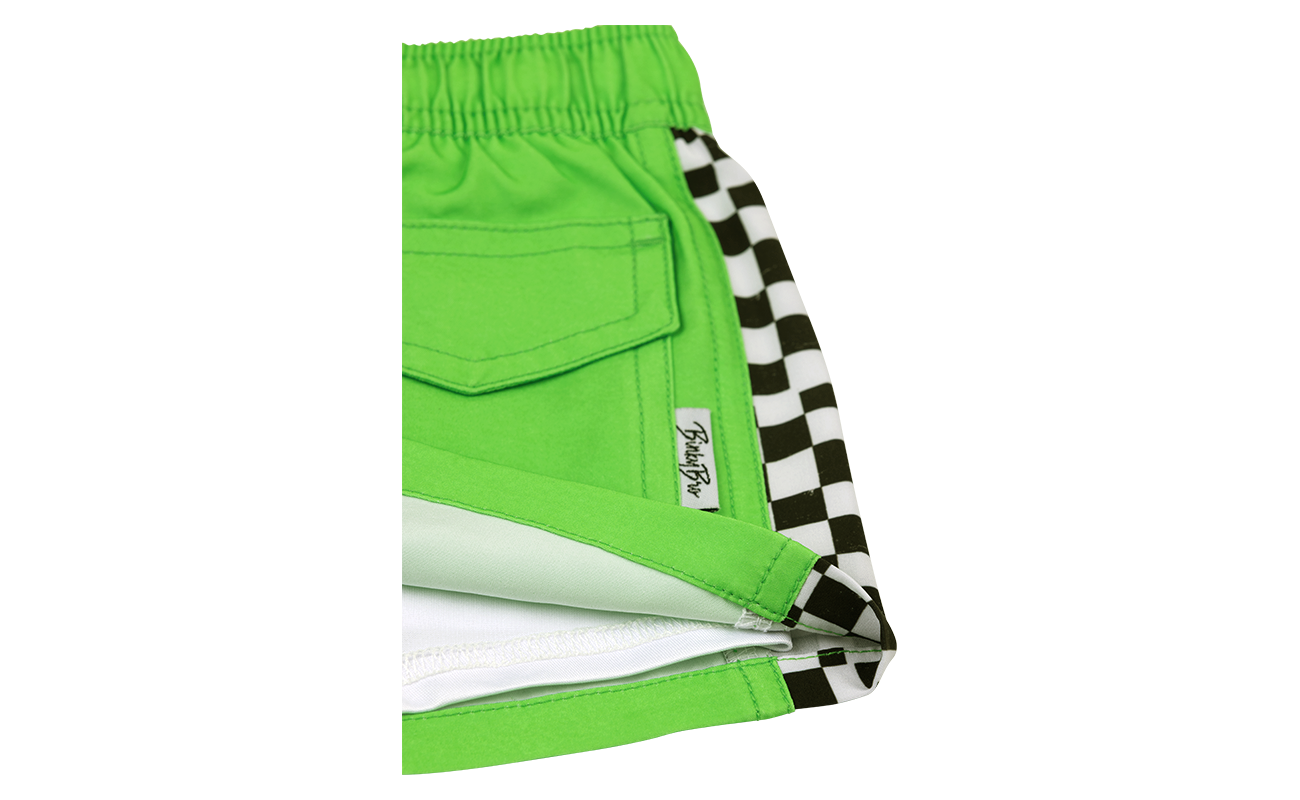 Bright green swim shorts featuring a checkered pattern on the sides, designed for kids' active lifestyles.