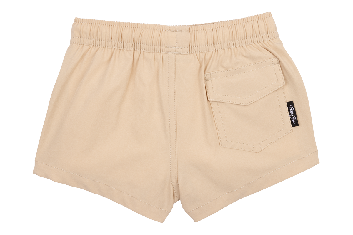 Beige Lyon 25 shorts featuring an elastic waistband and a back pocket, designed for infants and toddlers.