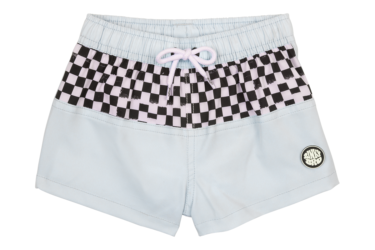 Light blue swim shorts with a black and pink checkerboard waistband and a small logo patch on the front.