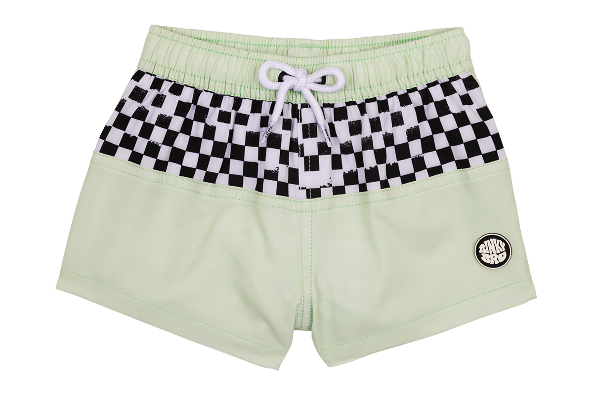 Green Lyon 25 swim shorts featuring a black and white checkered waistband and BinkyBro logo. Ideal for active kids.
