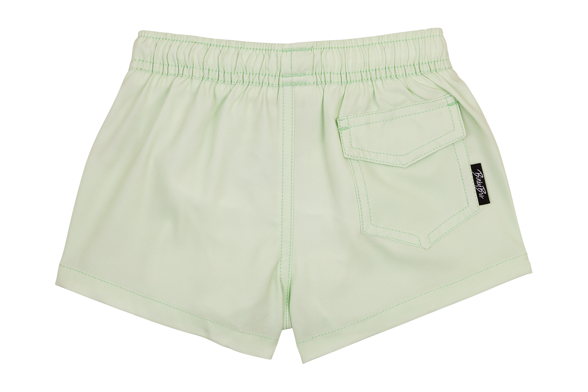 Light green shorts with an elastic waistband and a back pocket, designed for infants and toddlers.