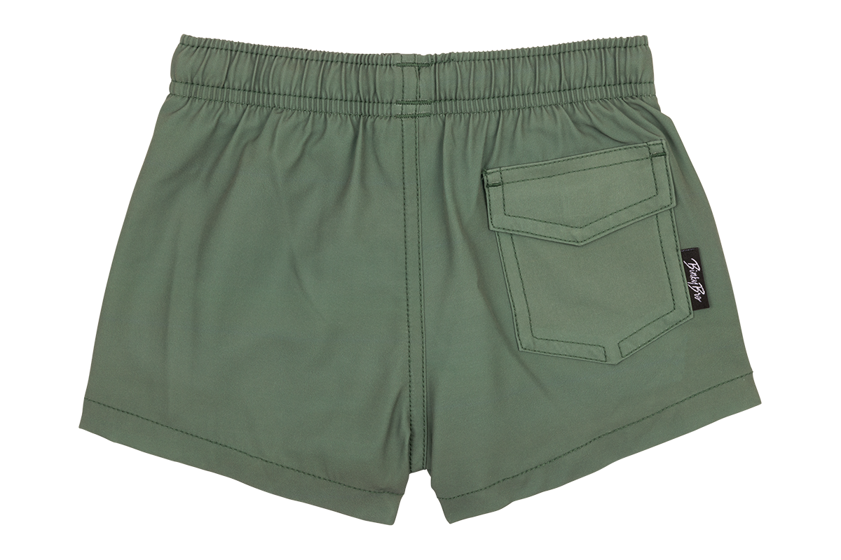 Back view of green Hubba Hideout shorts featuring an elastic waistband and a single pocket with a tag.