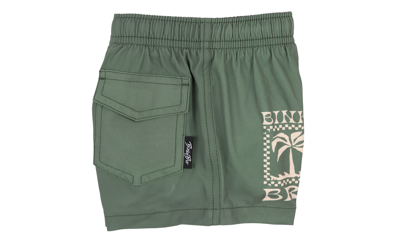 Green shorts featuring a palm tree graphic and a back pocket, designed for kids' surf-snow-skate lifestyle.