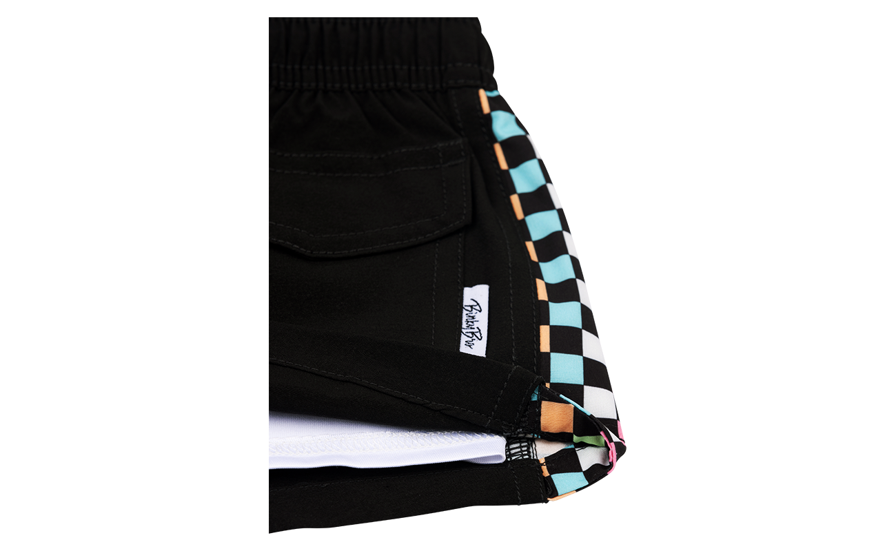 Stylish black shorts featuring a colorful checkerboard trim, perfect for infants and toddlers. Ideal for active play.