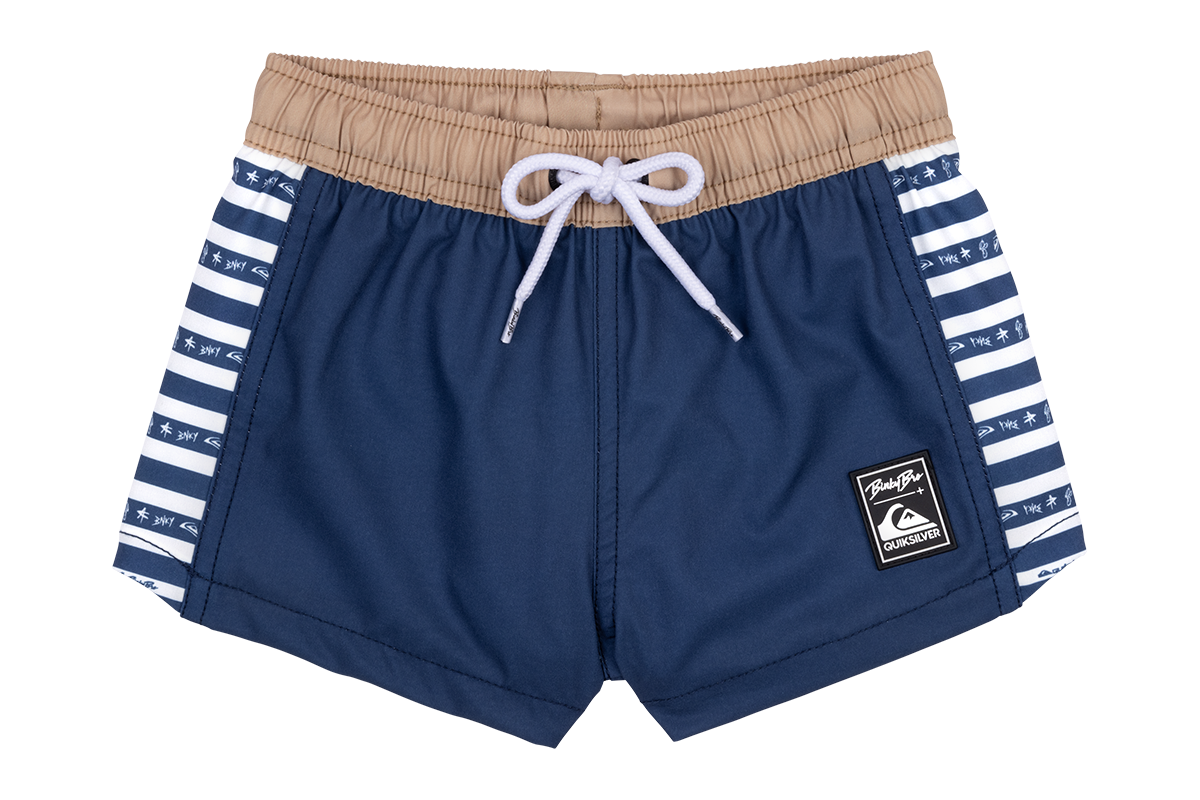 Navy blue swim shorts with striped sides and a drawstring waist, featuring a Quiksilver logo patch. Ideal for active kids.
