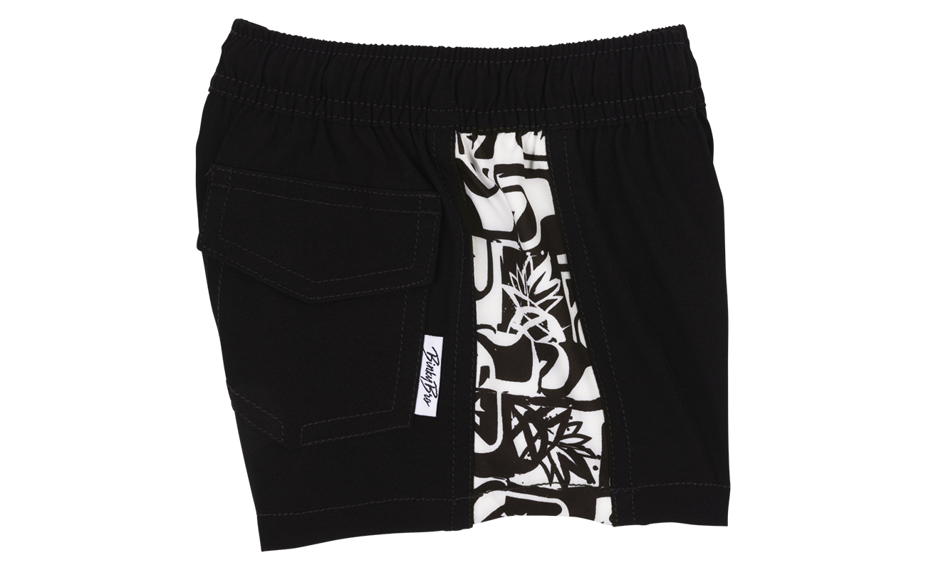 Stylish black shorts featuring a unique patterned lining, designed for infants and toddlers, perfect for active play.