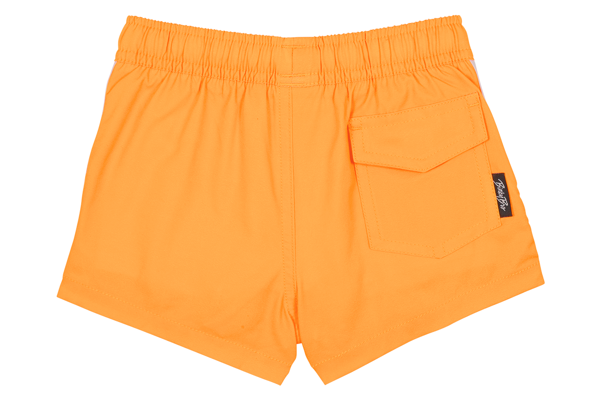 Bright amber swim shorts with an elastic waistband and a side pocket, perfect for active kids. Ideal for summer fun.