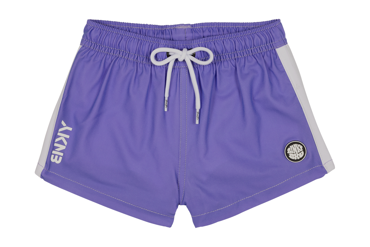 Stylish purple swim shorts with a white drawstring and side stripes, perfect for kids' summer adventures.