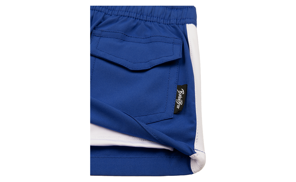 Close-up of the Blaze Royal shirt featuring a blue fabric with a white trim and a pocket detail, showcasing BinkyBro branding.