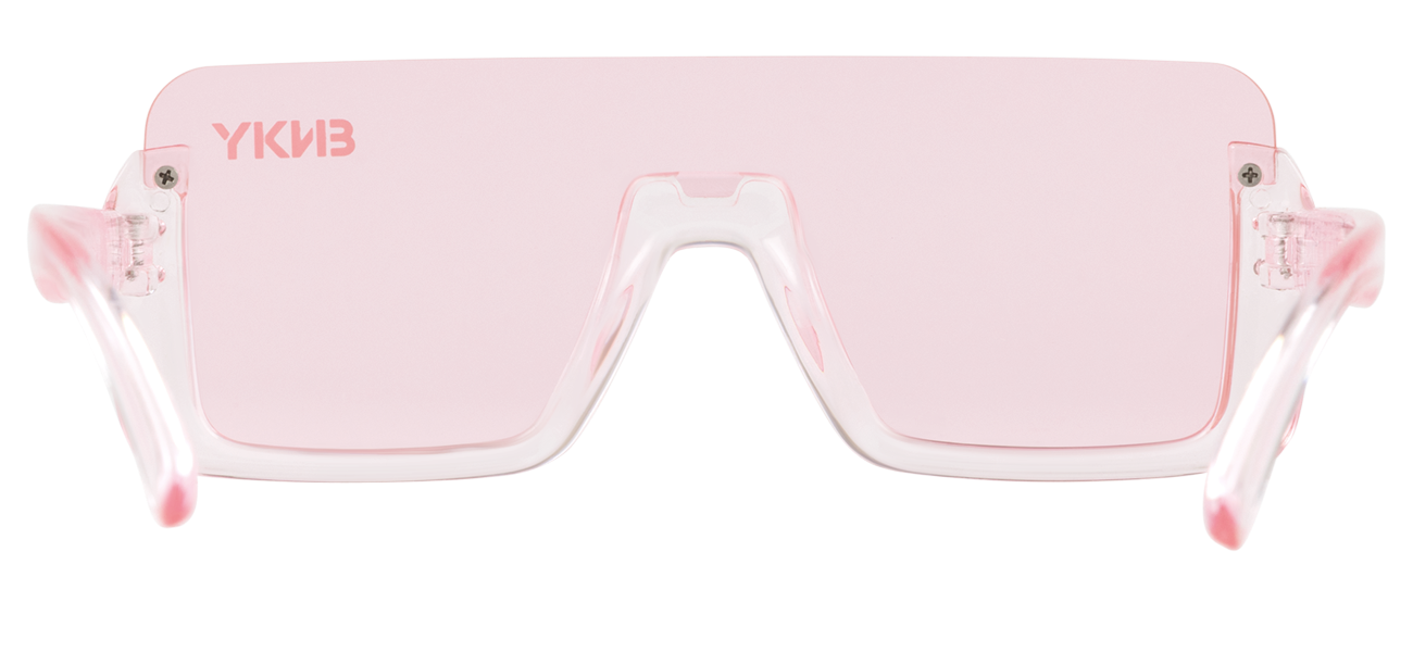 Stylish pink oversized sunglasses with a transparent frame, perfect for a trendy summer look. Ideal for outdoor adventures.
