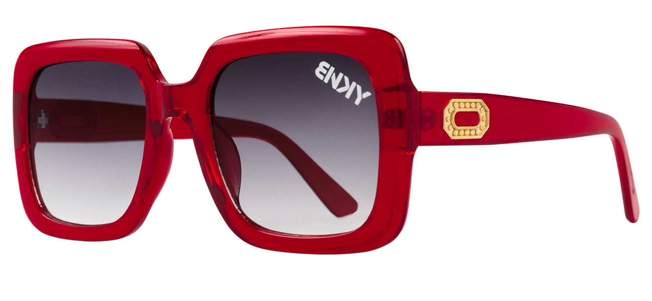 Bold red oversized sunglasses with gradient lenses and a gold accent on the temple, perfect for stylish sun protection.