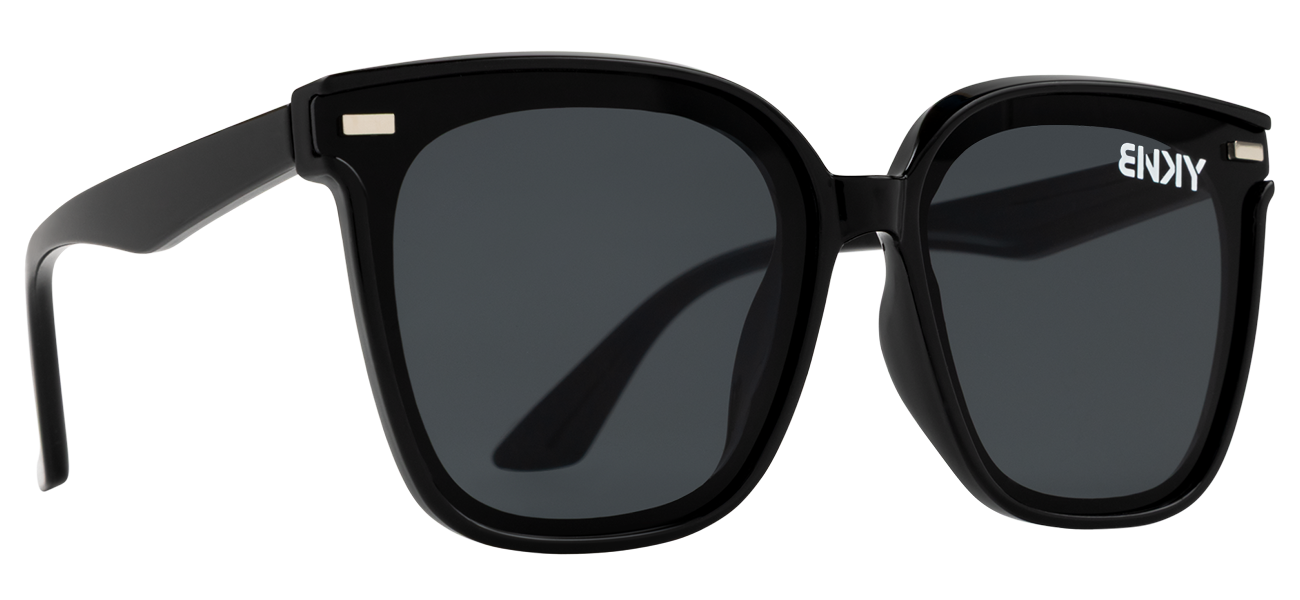 Stylish black sunglasses with a bold square frame and dark lenses, perfect for a trendy look. Ideal for outdoor adventures.