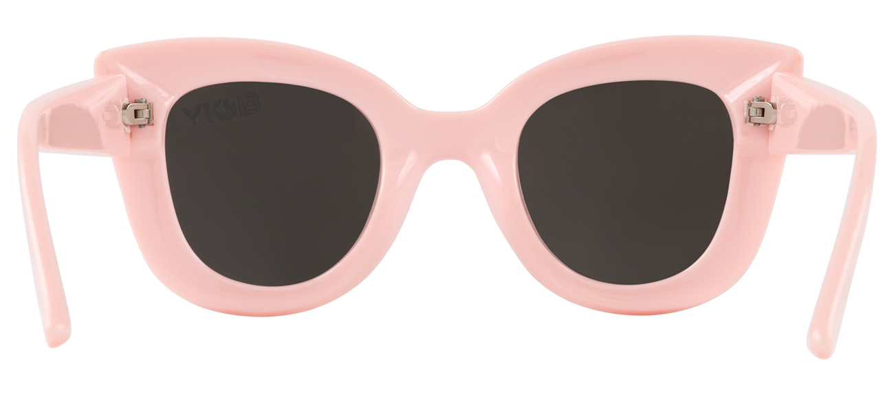Stylish pink cat-eye sunglasses with dark lenses, perfect for adding a trendy touch to any outfit. Ideal for kids.