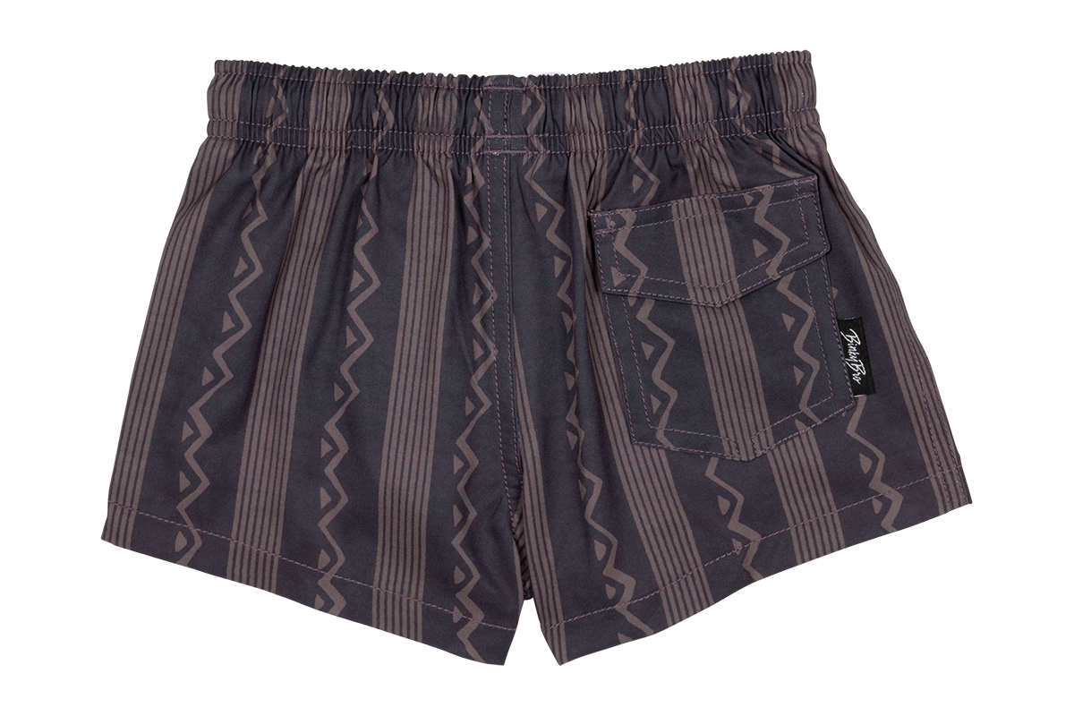 Stylish Mesa swim shorts featuring a zigzag pattern, designed for infants and toddlers, perfect for beach or pool outings.