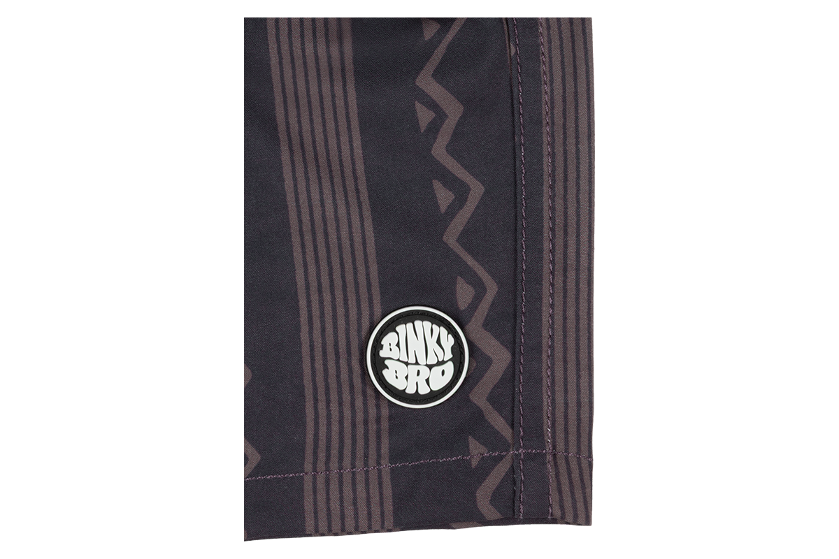 Close-up of the Mesa apparel featuring a stylish geometric pattern and the BinkyBro logo on the hem.