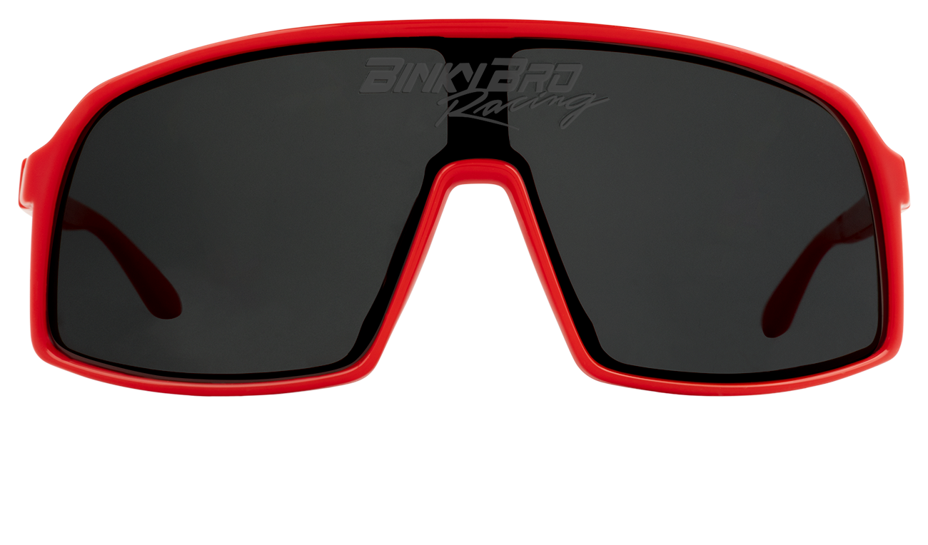 Stylish crimson junior sunglasses with large black lenses, perfect for young racing enthusiasts and outdoor adventures.