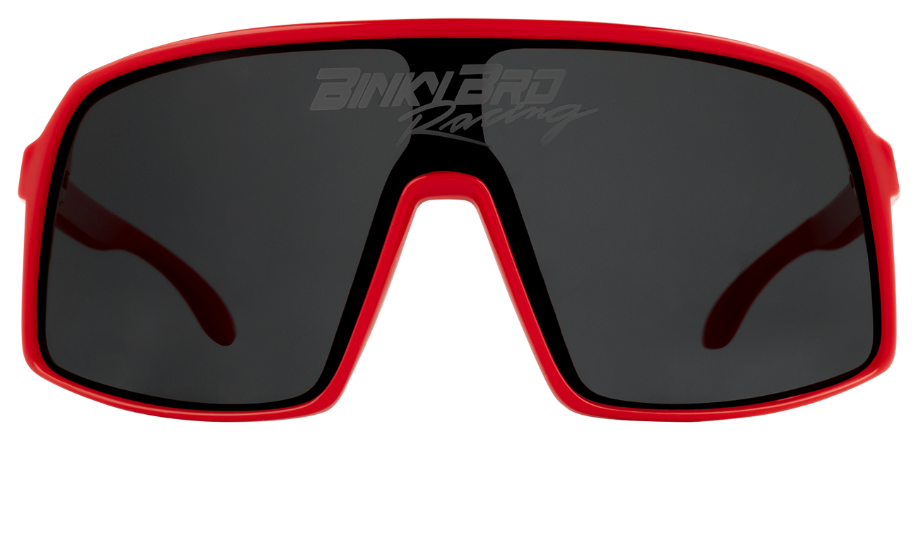 Sleek crimson sunglasses with a bold design and dark lenses, perfect for active youth and outdoor adventures.