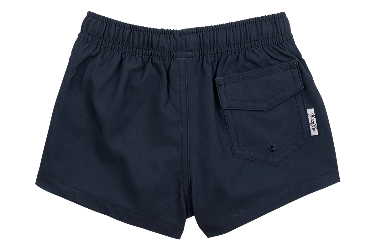 Navy blue swim shorts for kids featuring an elastic waistband and a back pocket, designed for comfort and style.