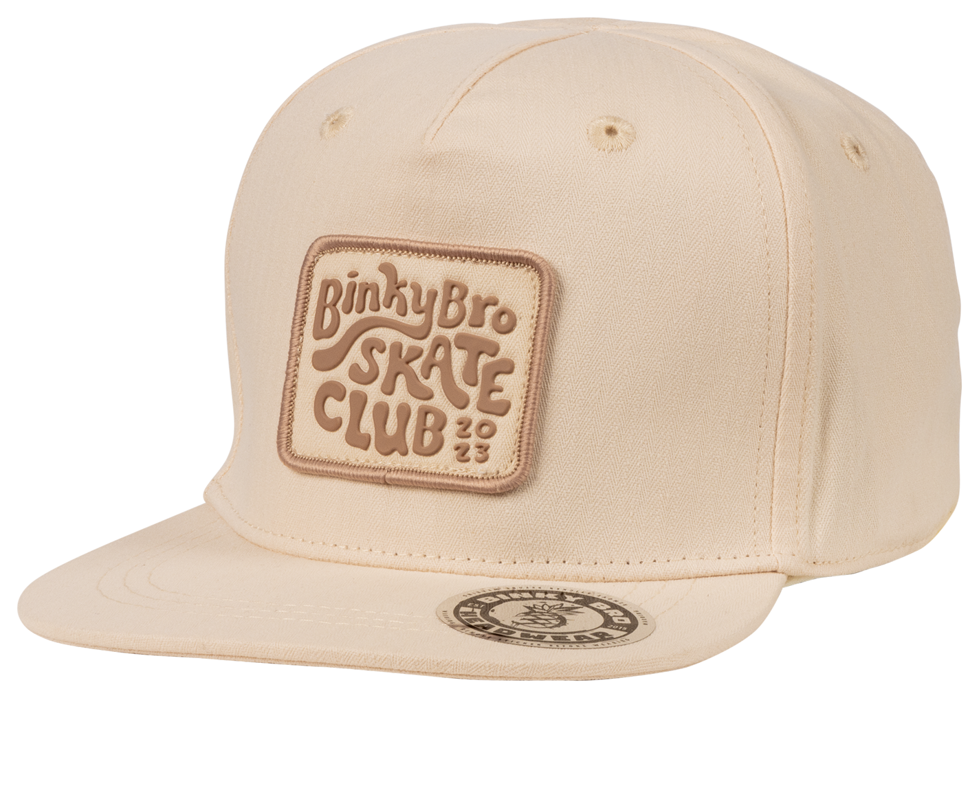 Cream-colored snapback hat featuring a textured "Binky Bro Skate Club 2023" patch on the front.