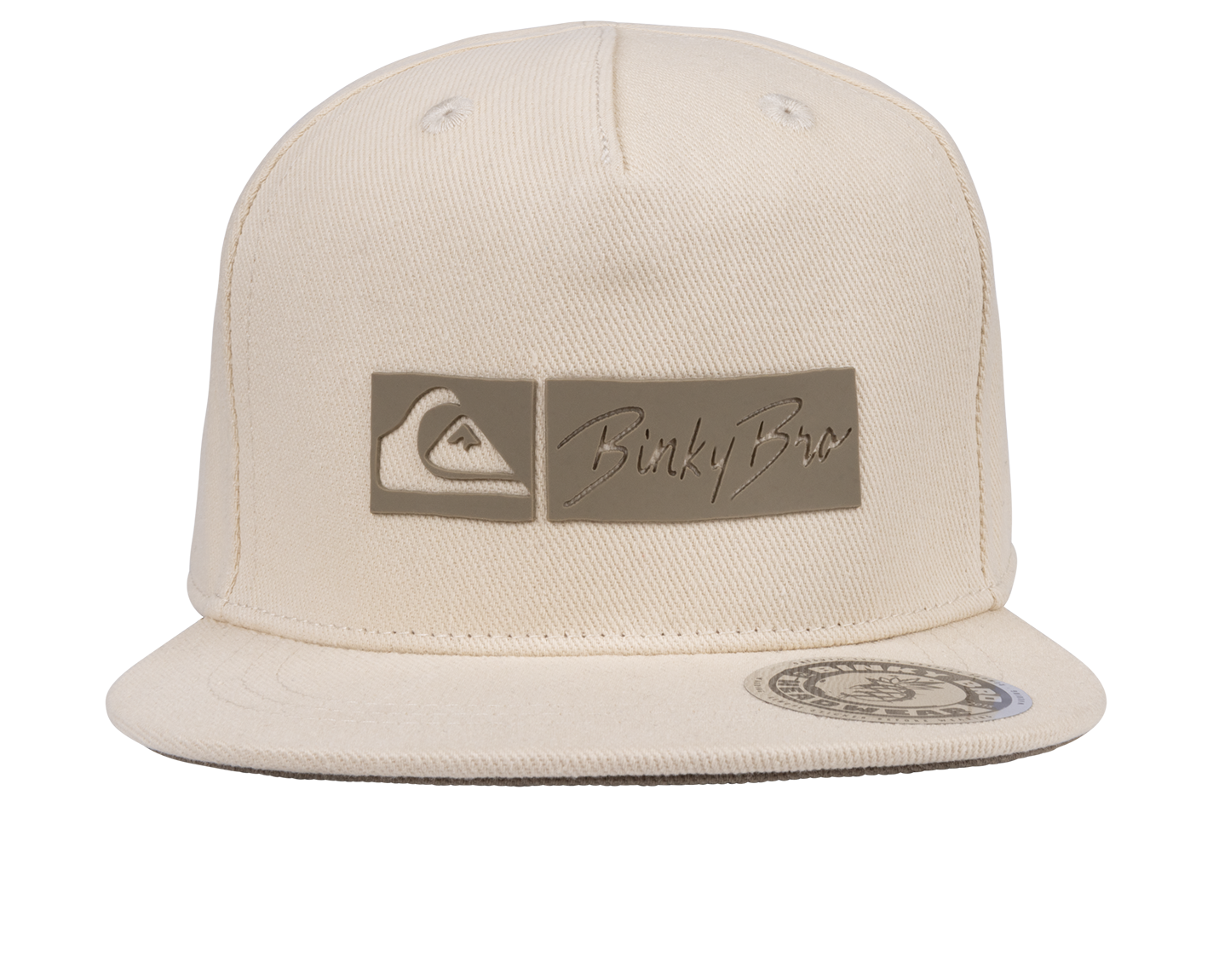 Cream snapback hat featuring a stylish BinkyBro logo and a Quiksilver emblem, perfect for kids' surf-snow-skate style.