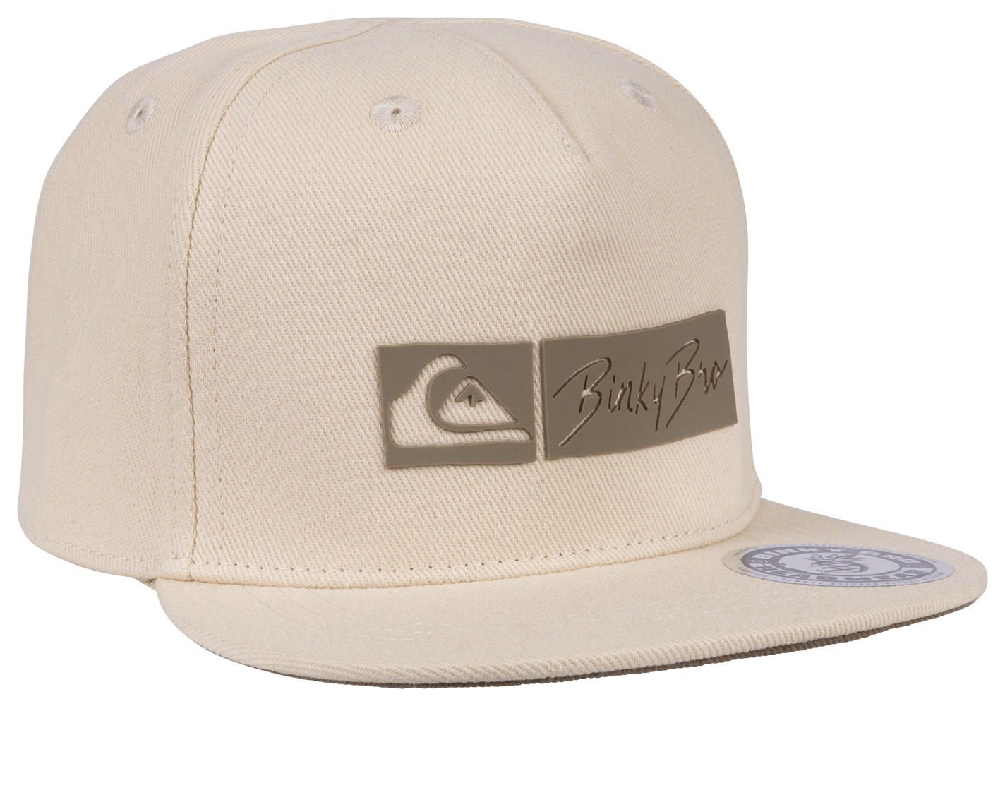 Cream snapback hat featuring a bold Quiksilver logo and BinkyBro branding, designed for stylish kids' fashion.