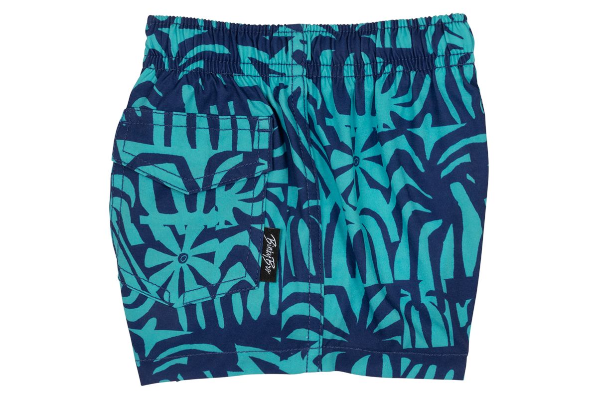 Tahitian swim shorts featuring a vibrant blue and teal tropical leaf pattern, perfect for stylish summer adventures.
