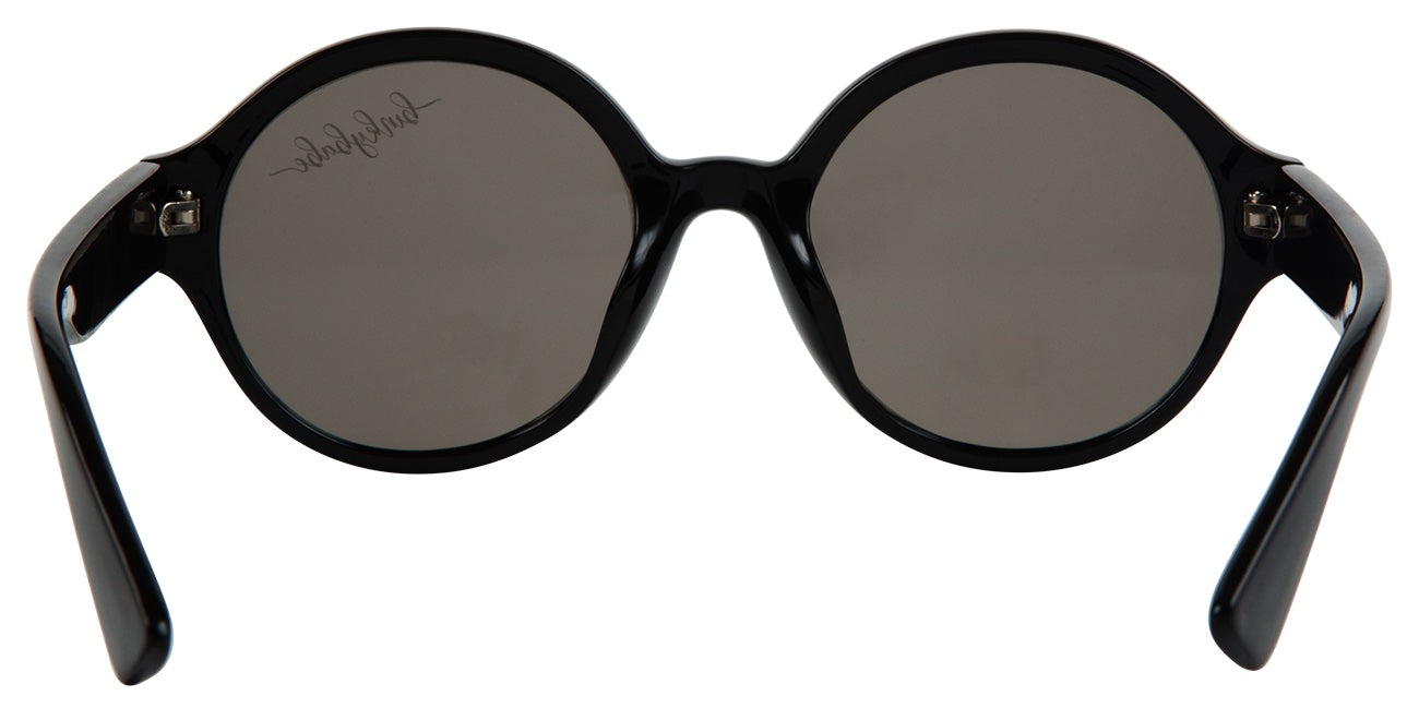 Stylish black round sunglasses with dark lenses and sleek arms, perfect for trendy youth and kids.