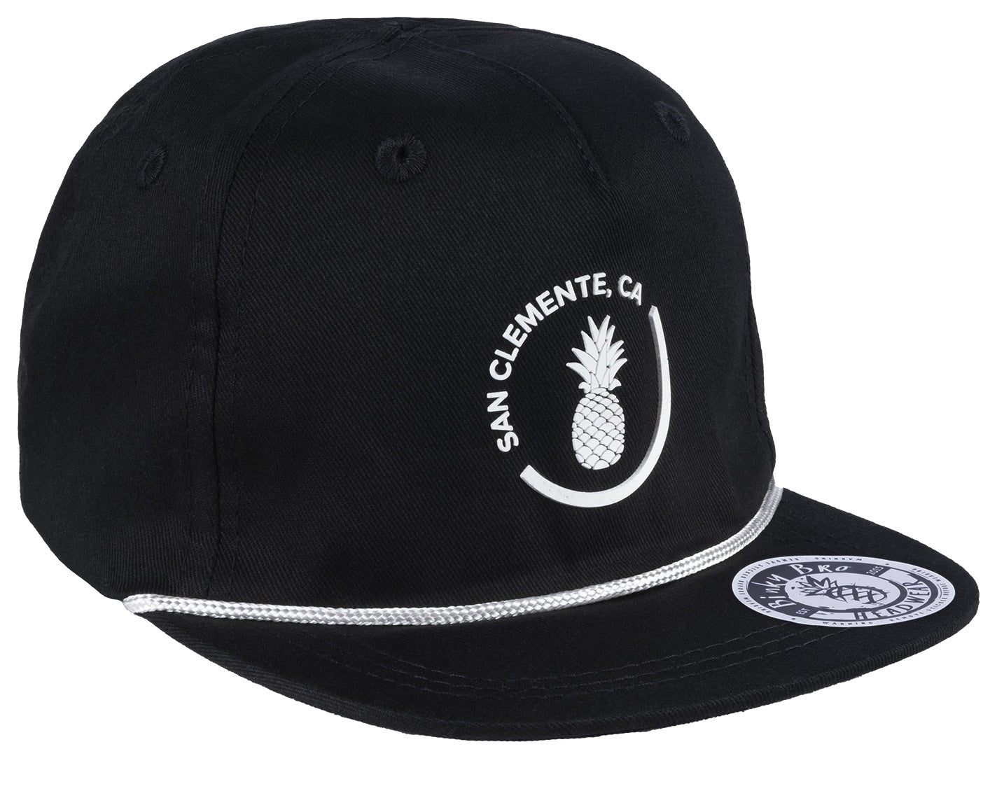 Stylish black snapback cap featuring a pineapple graphic and "San Clemente, CA" text, perfect for kids' surf-snow-skate lifestyle.