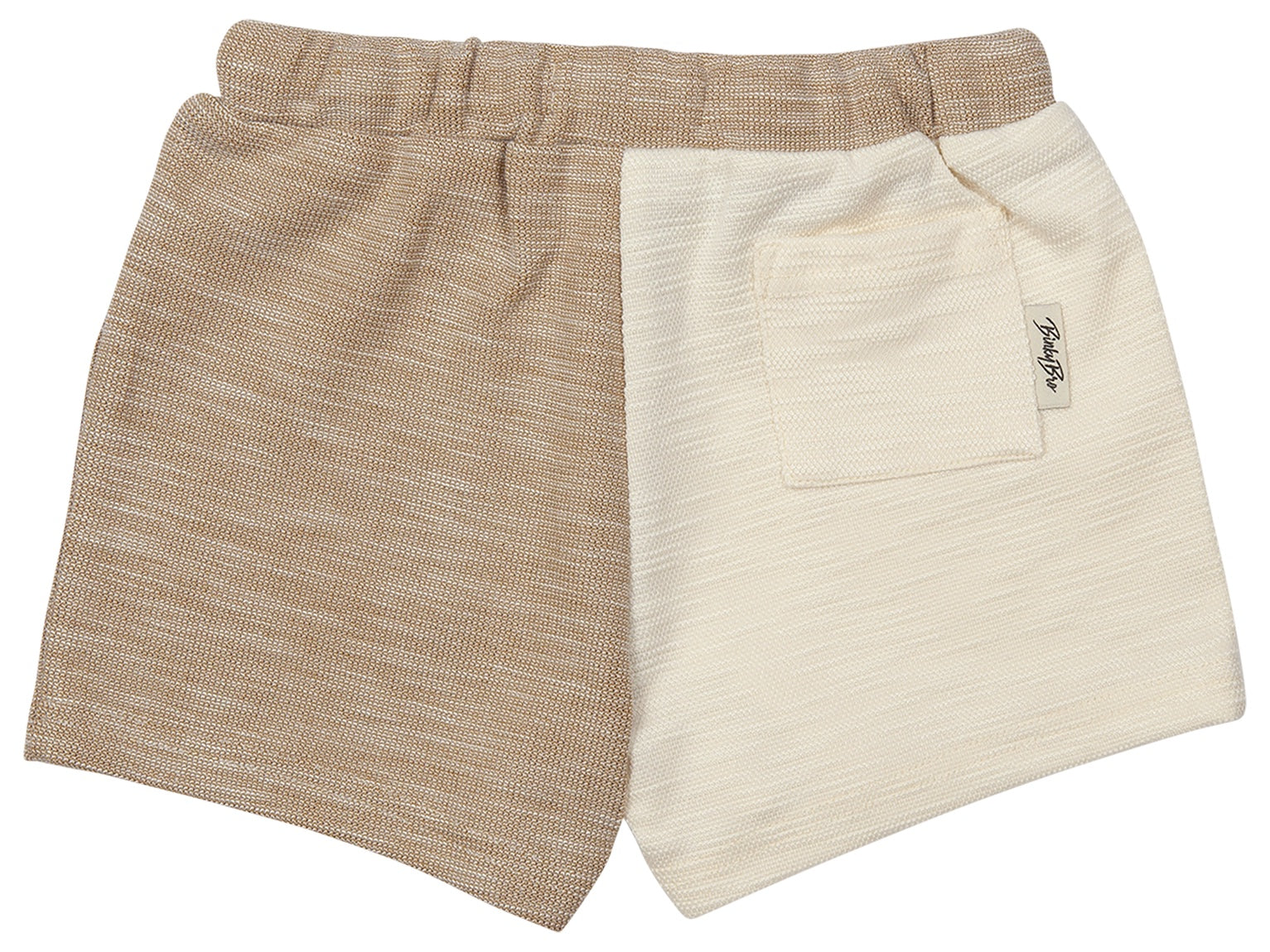 Beige toddler shorts featuring a two-tone design with a pocket, perfect for stylish summer wear.