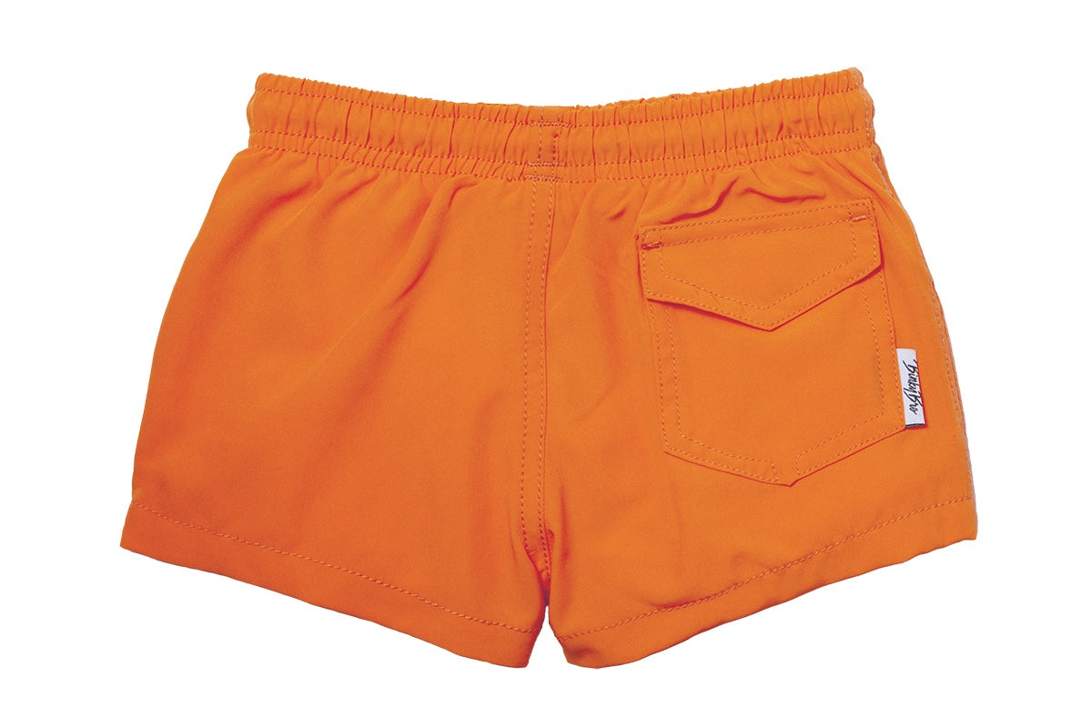 Bright orange San Juan Swimmie shorts for kids, featuring an elastic waistband and a back pocket for small items.
