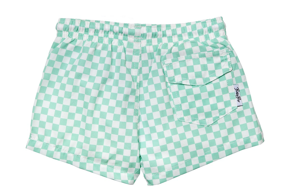 Mint green checkered swim shorts for kids with an elastic waistband and a back pocket, perfect for beach days.
