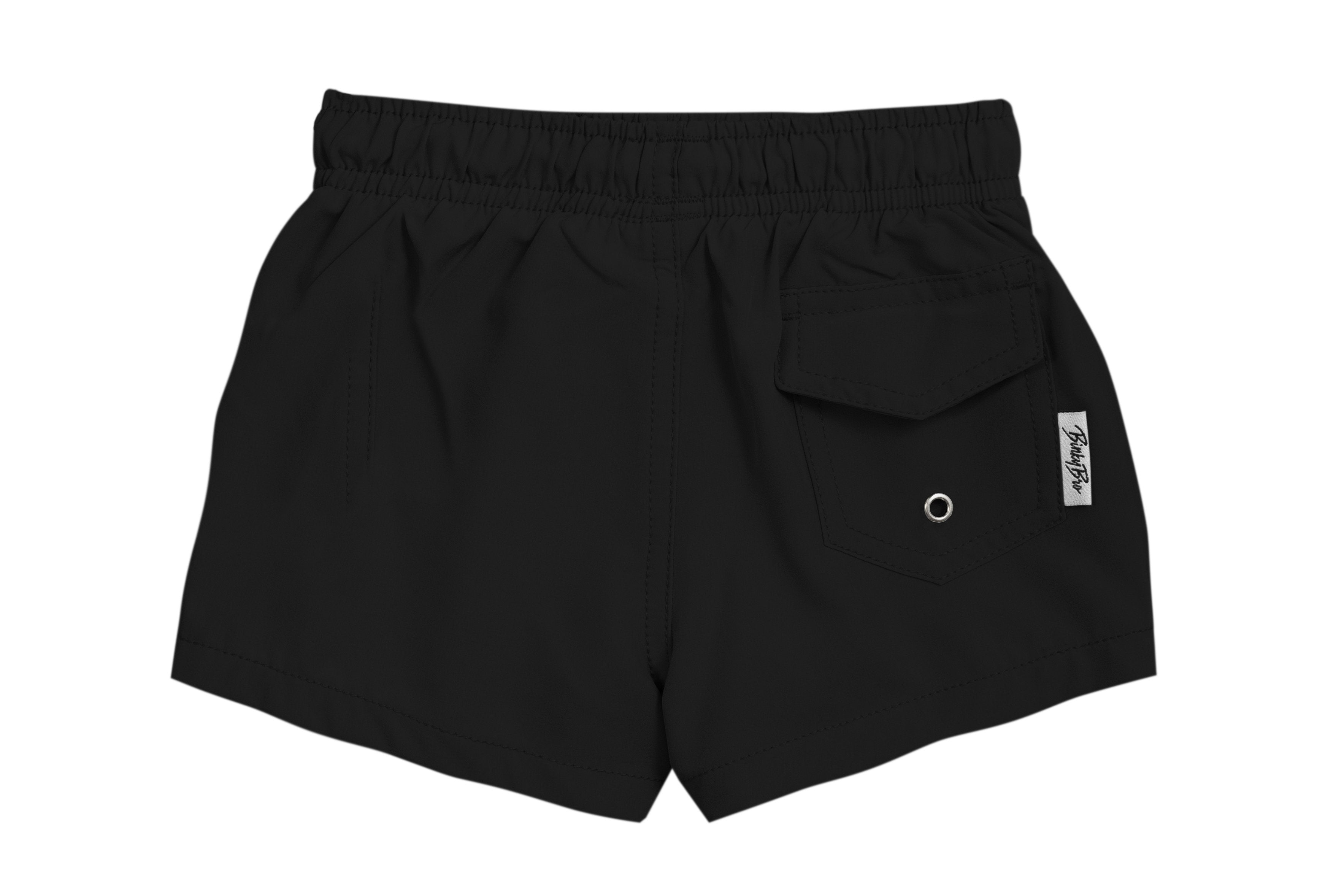 Black swim shorts for kids featuring an elastic waistband and a side pocket, perfect for beach and pool days.